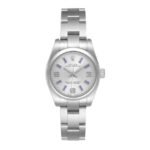 Rolex Oyster Perpetual a silver/rhodium dial paired with distinct blue-filled index baton markers and white gold Arabic 3, 6, and 9 numerals).